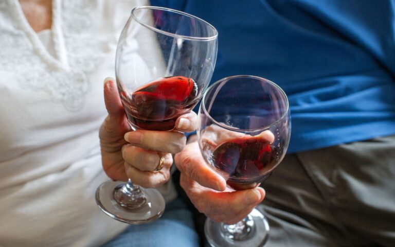 residents with wine glasses